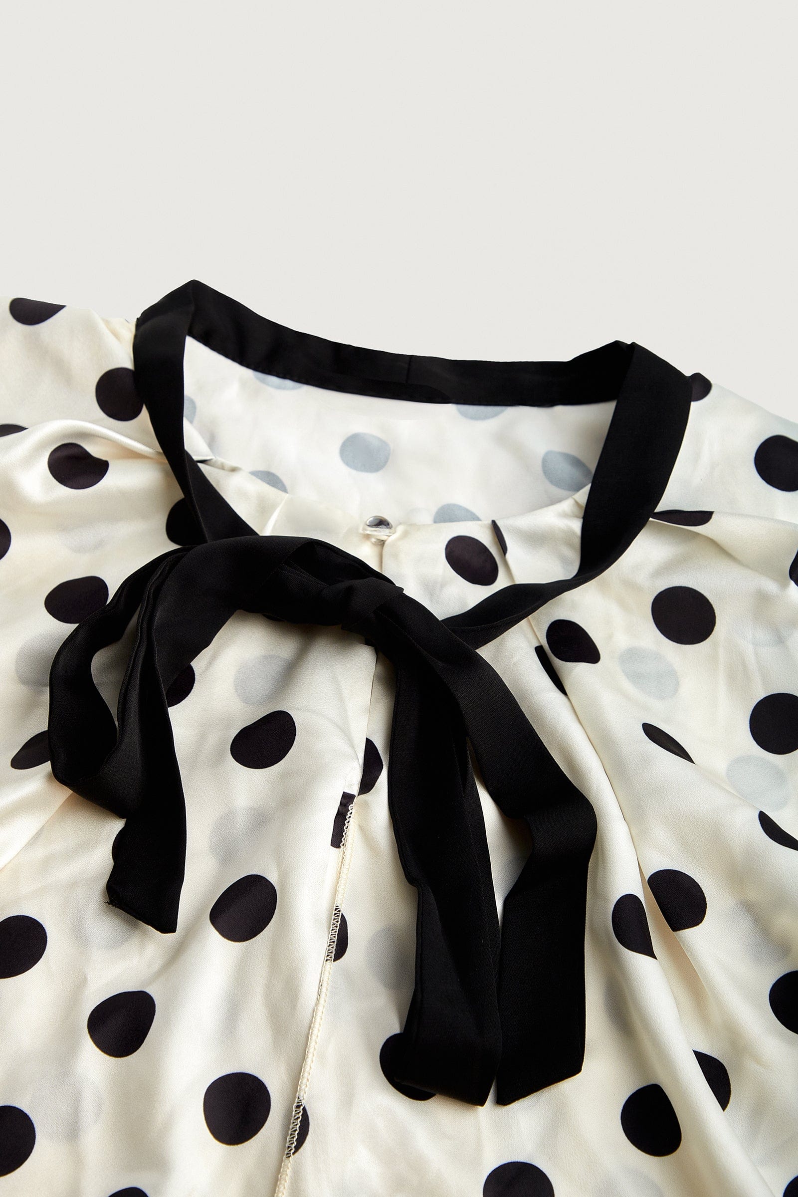 Ivory Polka Dot Flounce-Trimmed Tie Neck Chiffon Blouse